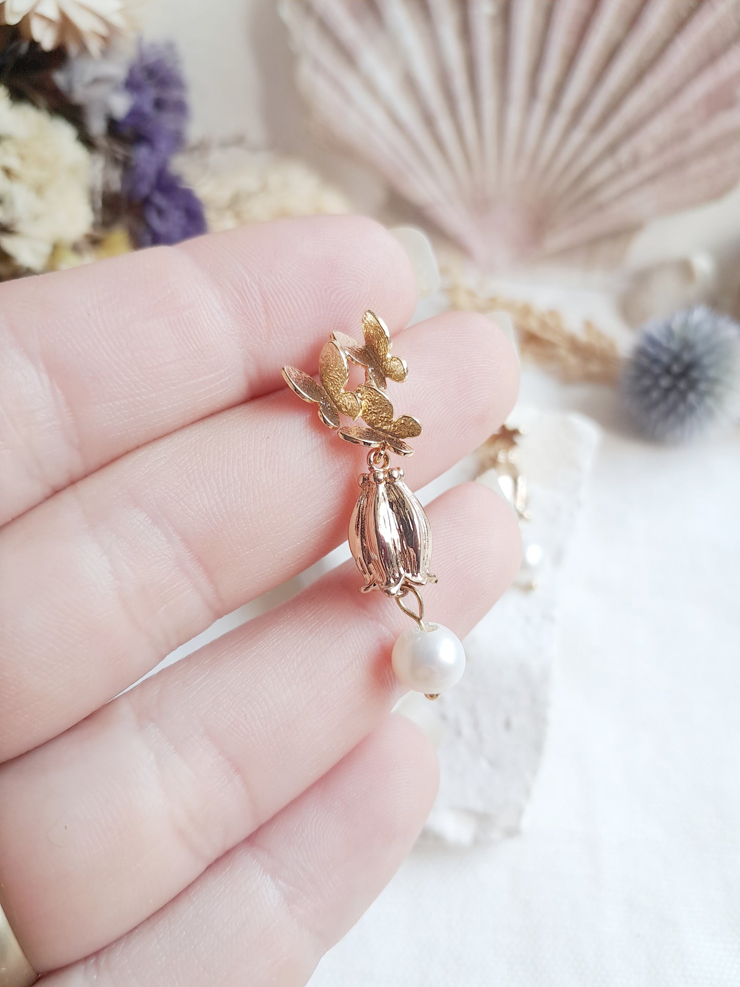 Boucles d'oreilles pendantes papillons et fleur