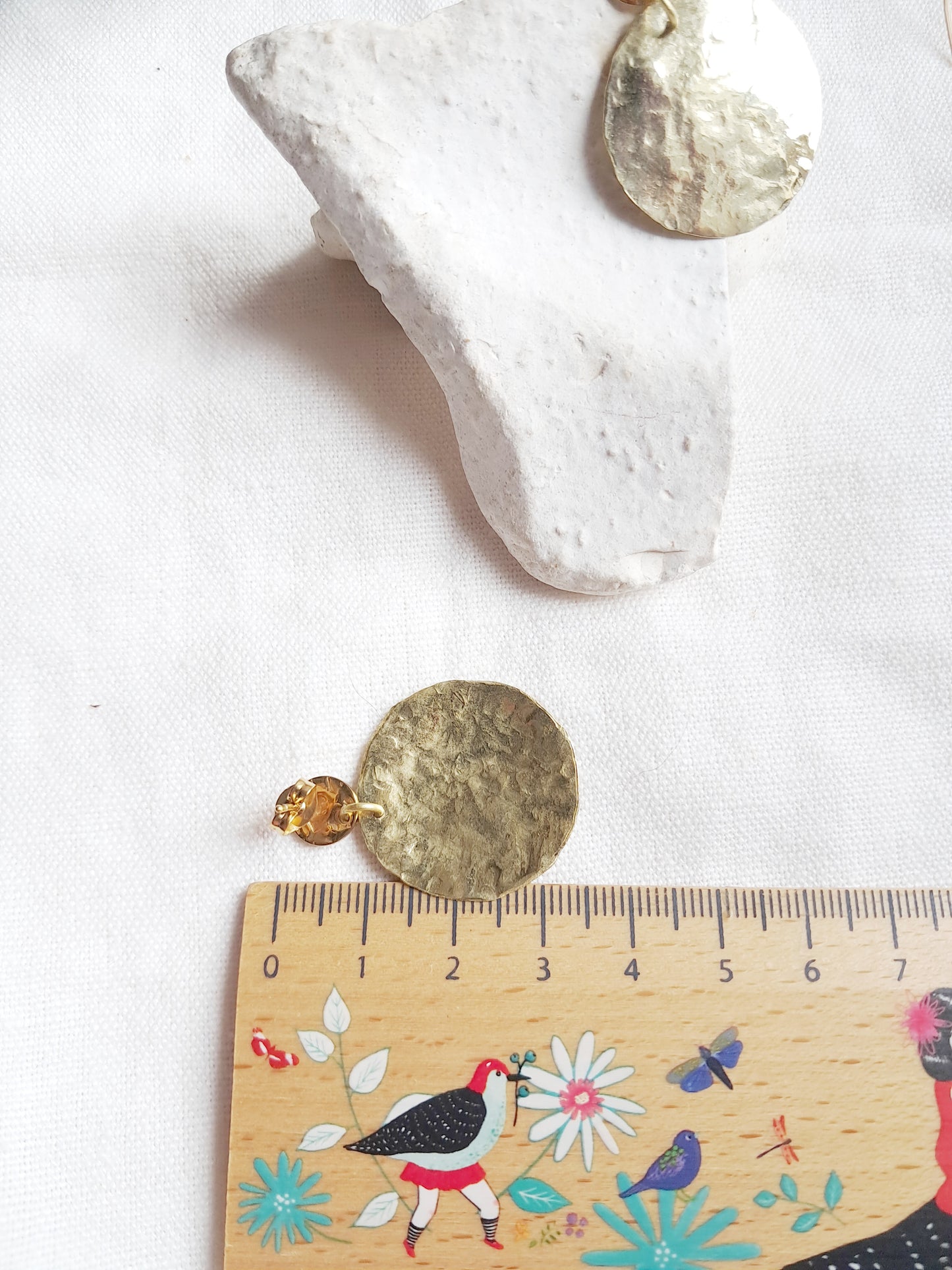 Boucles d'oreilles tendances disques texturés