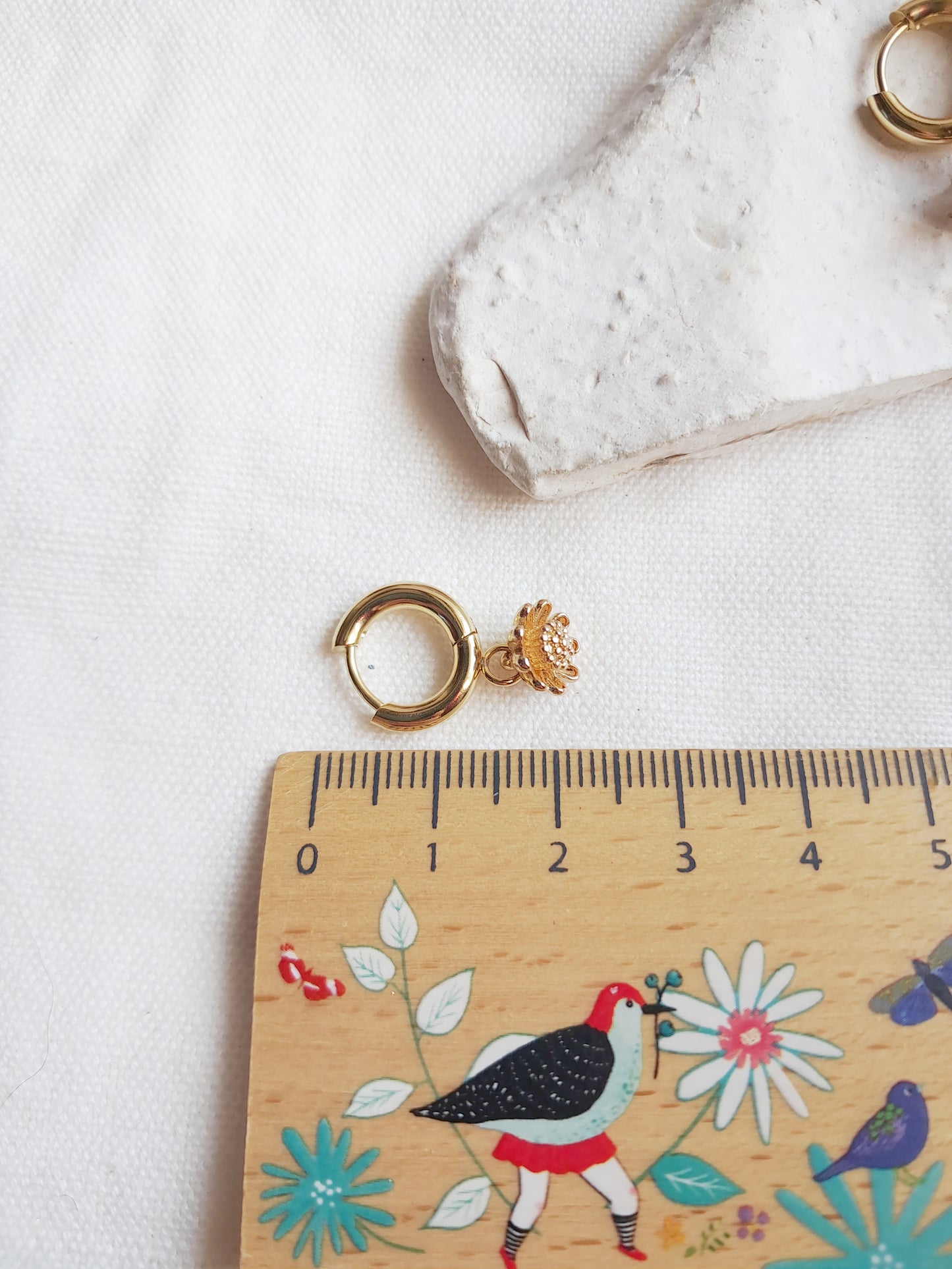 Boucles d'oreilles créoles fleurs en acier inoxydable doré