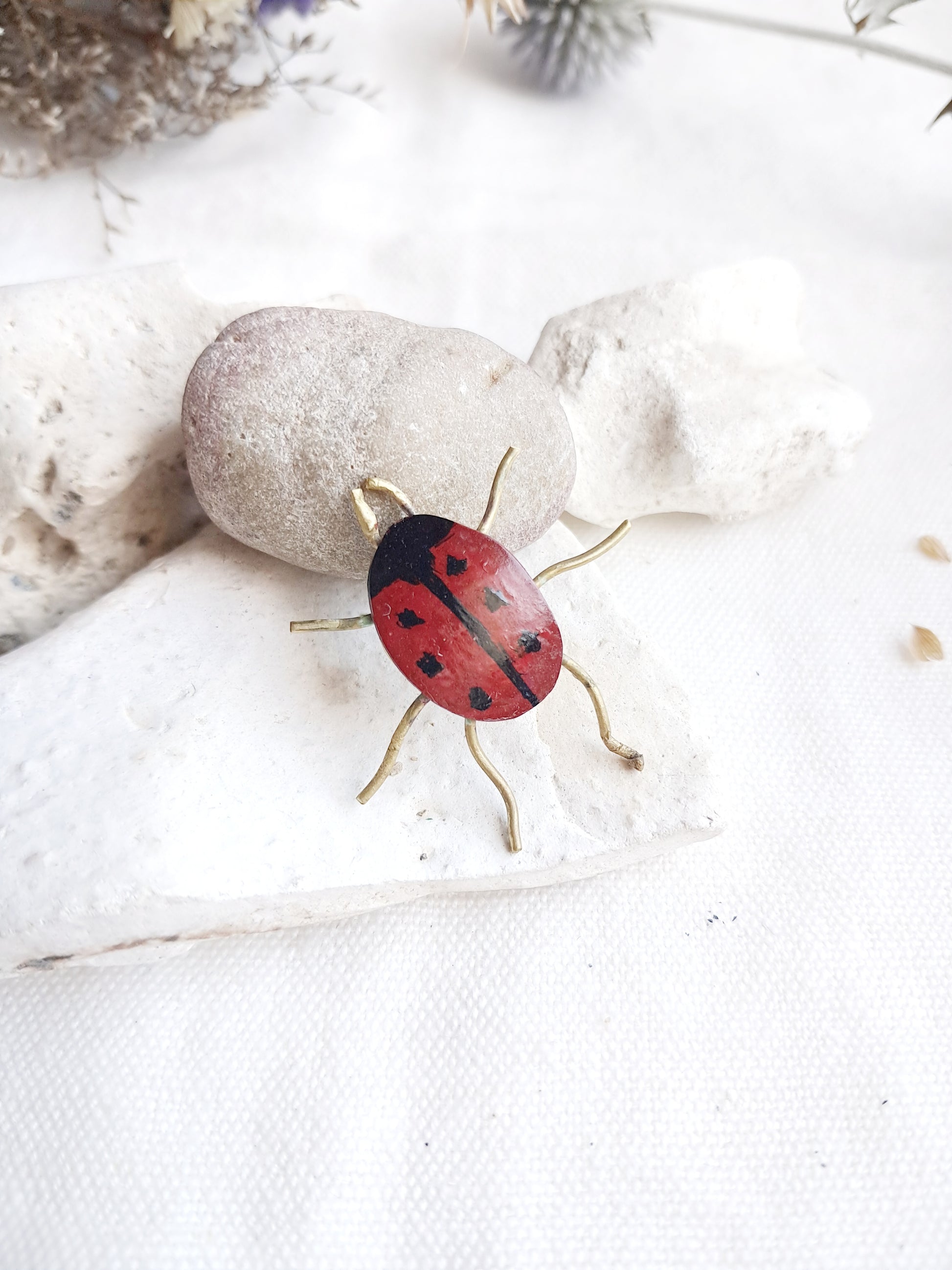 Pin's coccinelle en laiton