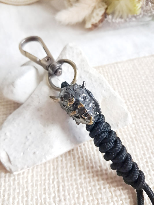 Porte-clés démon raksasi japonais en laiton