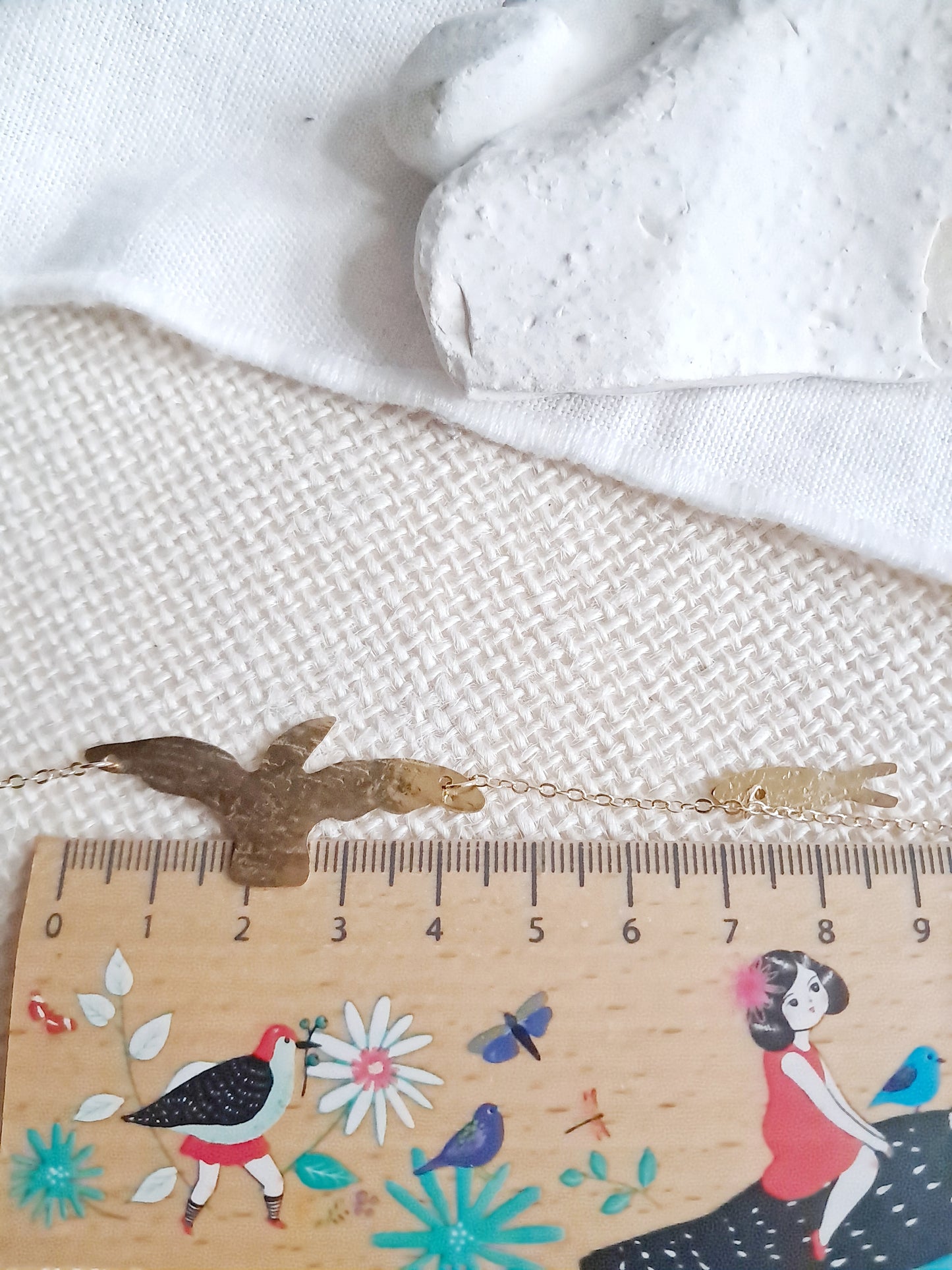 Collier oiseau et poisson en laiton