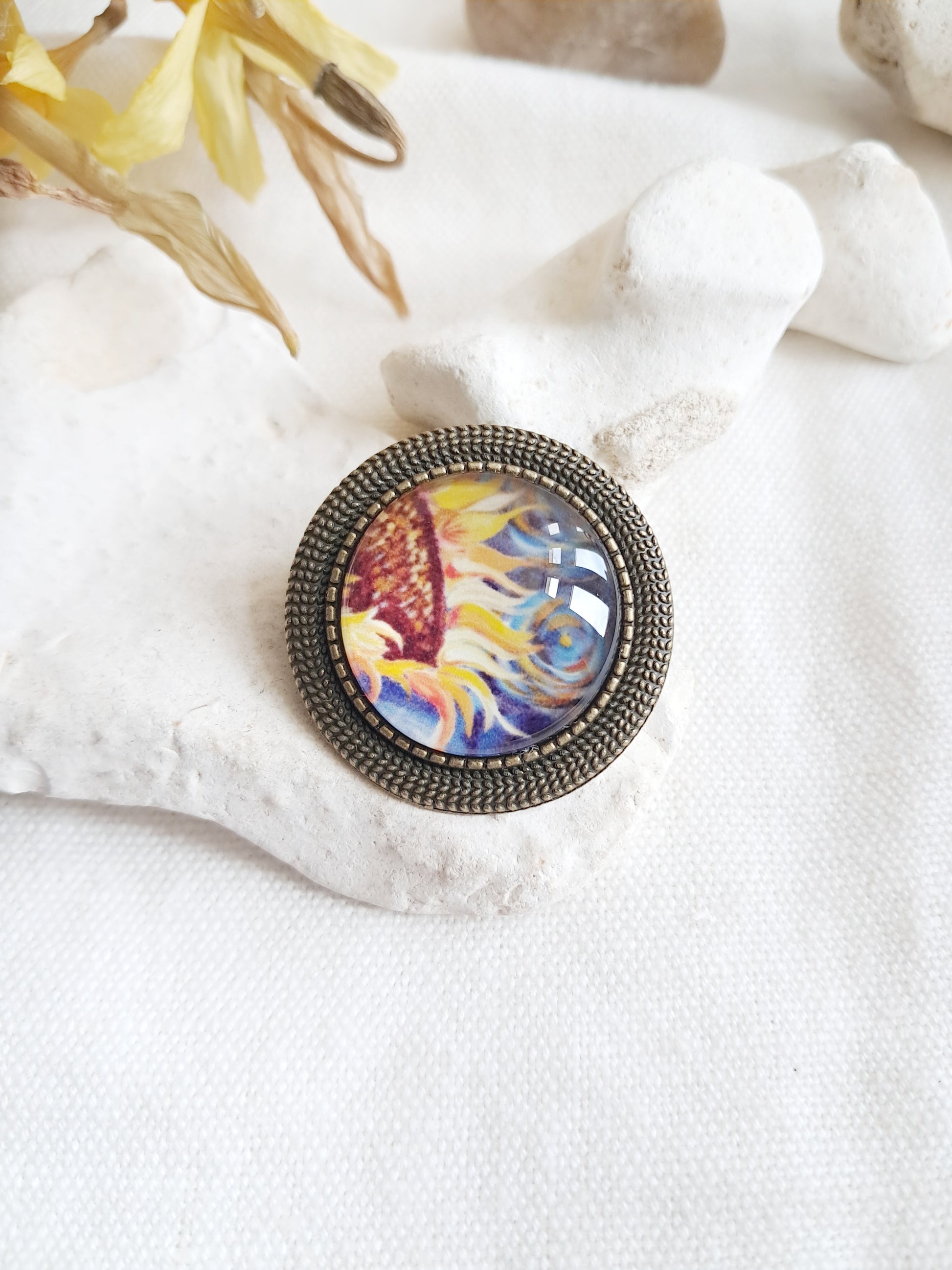 Broche cabochon fleur de tournesol de Van Gogh