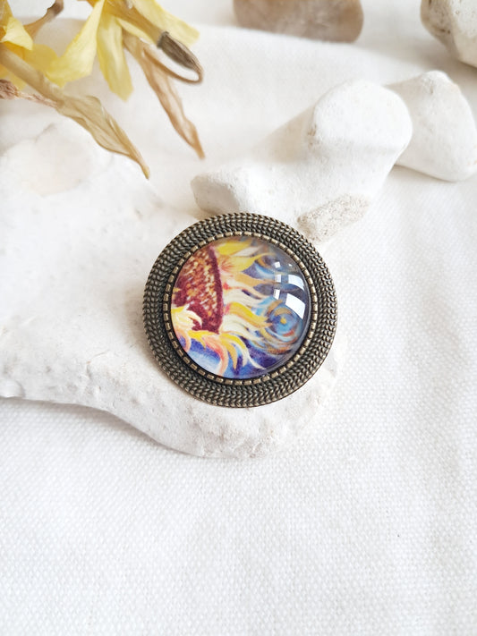 Broche cabochon fleur de tournesol de Van Gogh