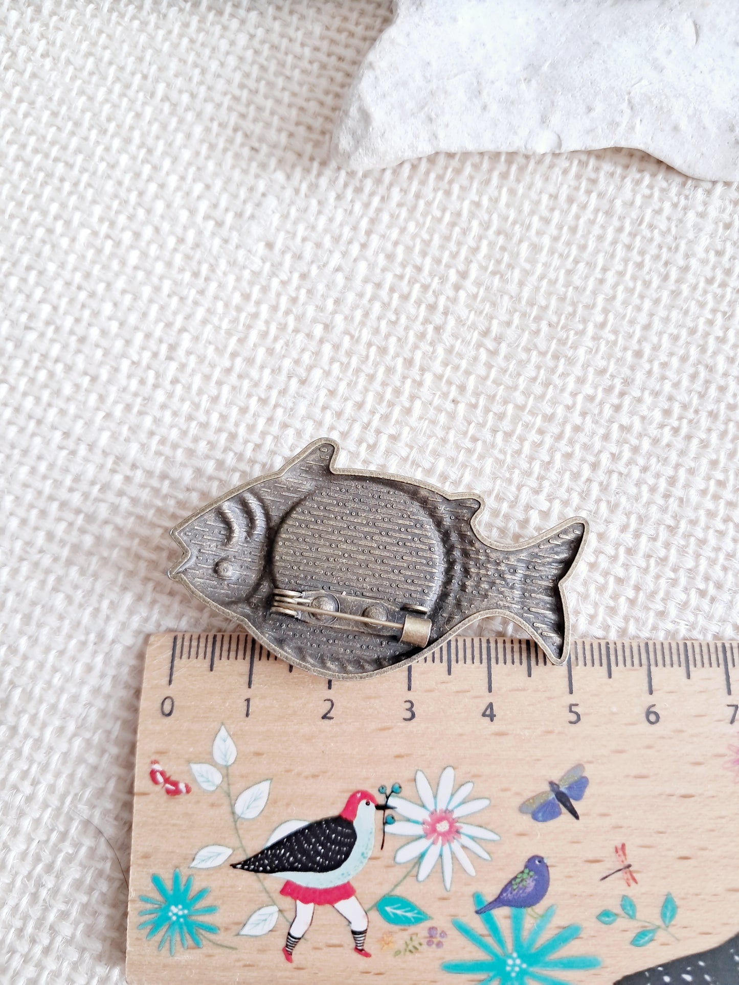 Broche cabochon poisson et coquillage